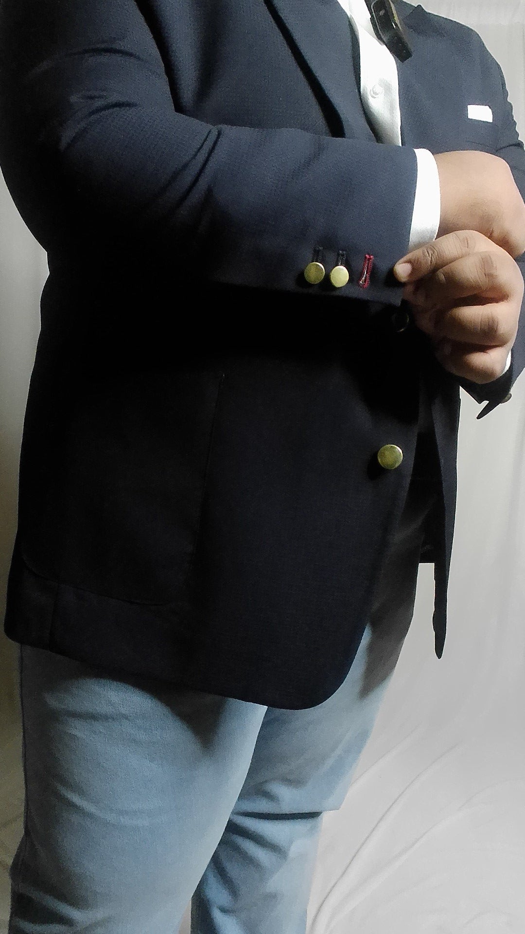 Surgeon cuffs closeup on a Super 140 Merino Wool Navy Blazer